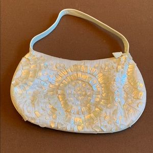 Shell embellished purse